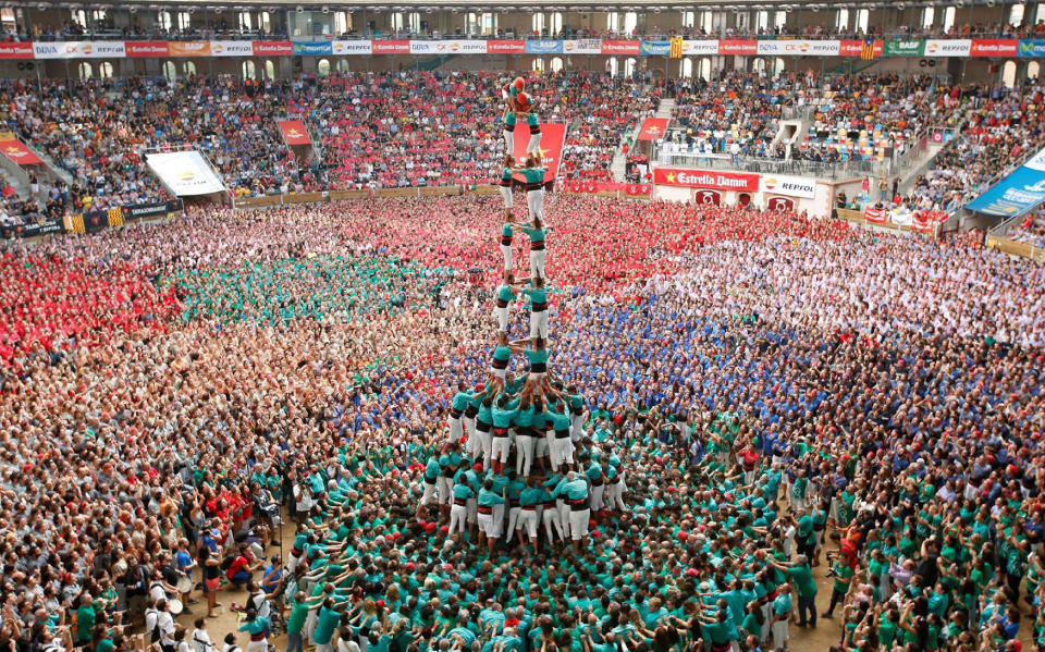 Castellers de Vilafranca form a human tower called “castell” in Tarragona city