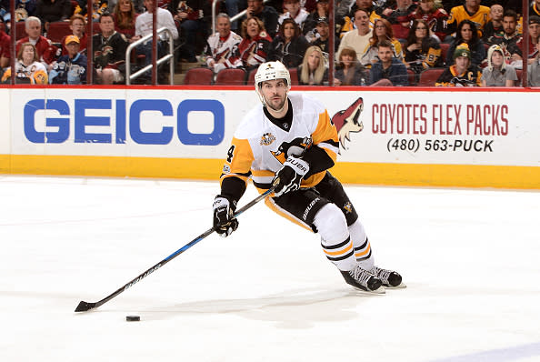 GLENDALE, AZ - FEBRUARY 11: Justin Schultz #4 of the Pittsburgh Penguins skates with the puck against the Arizona Coyotes at Gila River Arena on February 11, 2017 in Glendale, Arizona. (Photo by Norm Hall/NHLI via Getty Images)