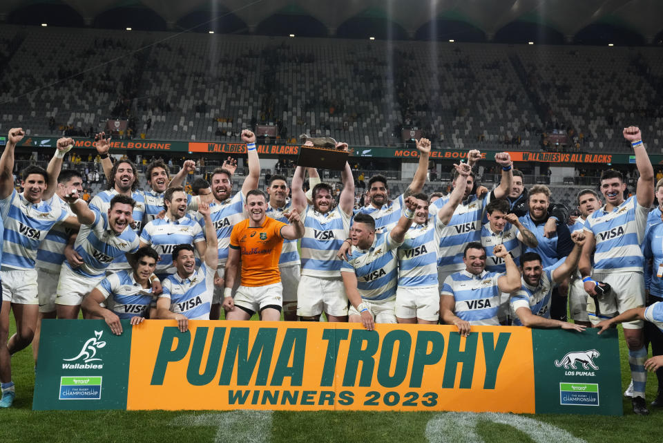 Argentina celebrate after defeating Australia in their Rugby Championship test match in Sydney, Australia, Saturday, July 15, 2023. (AP Photo/Rick Rycroft)