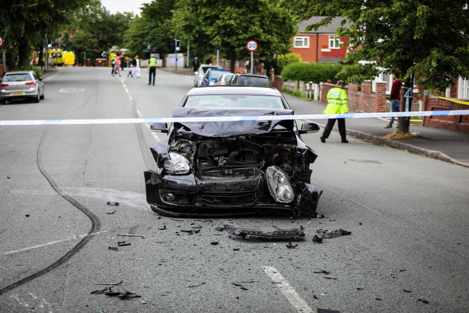Mangled: The remains of Girga's VW Golf following the collision in Crumpsall, Manchester. (MEN)