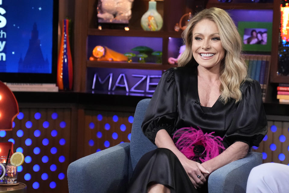 Kelly Ripa sat in an armchair