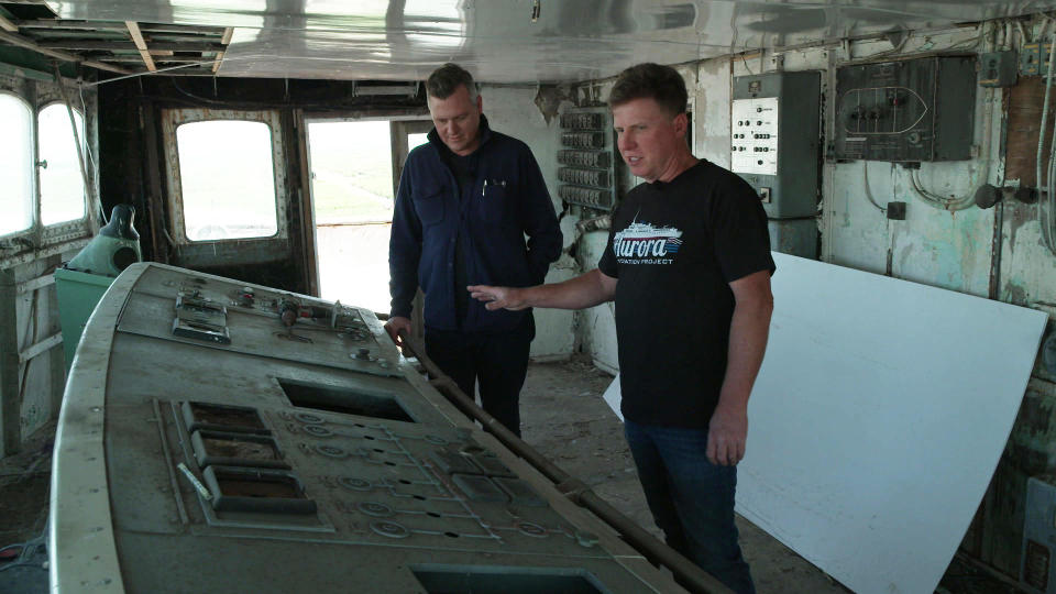 Chris Willson shows correspondent Luke Burbank the wheelhouse of the Aurora.  / Credit: CBS News