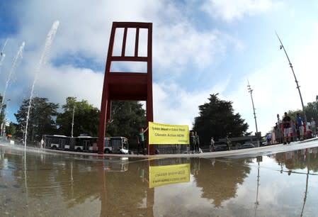 Greenpeace holds a protest in front of U.N. in Geneva