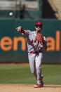 Los Angeles Angels shortstop Liván Soto throws to first for an out on Oakland Athletics' Jordan Diaz during the sixth inning of a baseball game in Oakland, Calif., Wednesday, Oct. 5, 2022. (AP Photo/Godofredo A. Vásquez)