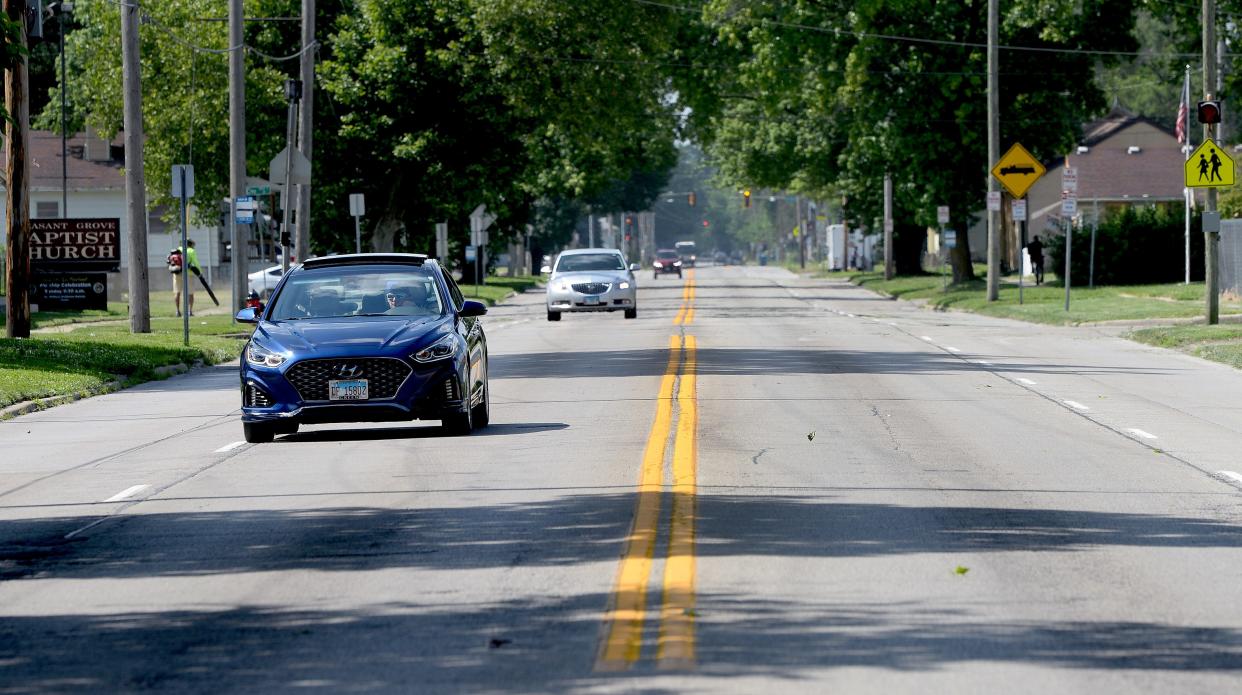 Cars travel along the 800 block of Martin Luther King Jr. Drive on June 16, 2022.