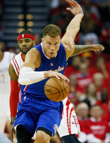 HOUSTON, TX - MAY 04: Blake Griffin #32 of the Los Angeles Clippers drives past Josh Smith #5 of the Houston Rockets during Game One in the Western Conference Semifinals of the 2015 NBA Playoffs on May 4, 2015 at the Toyota Center in Houston, Texas. NOTE TO USER: User expressly acknowledges and agrees that, by downloading and/or using this photograph, user is consenting to the terms and conditions of the Getty Images License Agreement. (Photo by Scott Halleran/Getty Images)
