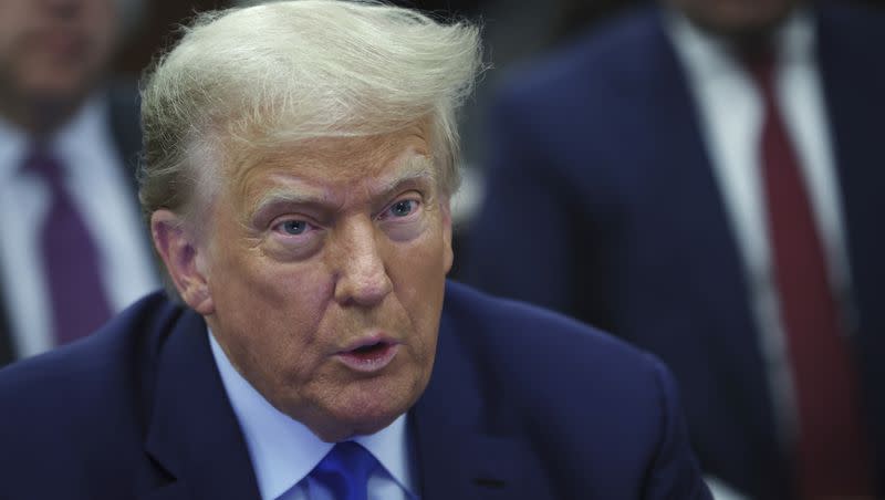 Former President Donald Trump sits in the courtroom with his legal team before the continuation of his civil business fraud trial at the New York Supreme Court on Tuesday, Oct. 24, 2023, in New York.