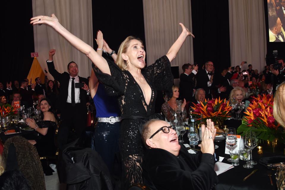 Sharon Stone is over-the-moon while watching the Oscars from the Elton John AIDS Foundation Viewing Party. 
