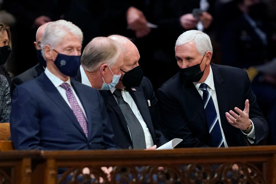 Former President Bill Clinton attends the funeral of former Sen. Bob Dole of Kansas, at the Washington National Cathedral, Friday, Dec. 10, 2021, in Washington. Before Clinton are from left, former Vice Presidents Dan Quayle, Dick Cheney and Mike Pence.