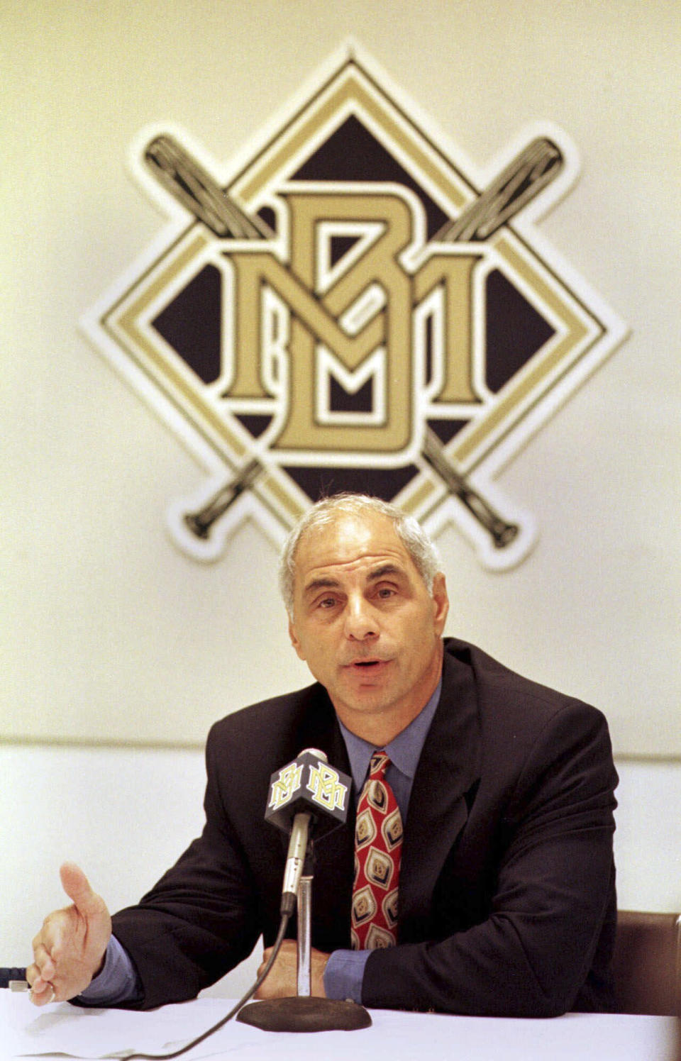 FILE - Former Milwaukee Brewers general manager Sal Bando answers questions at a press conference in Milwaukee on, Aug. 12, 1999. Bando, a three-time World Series champion with the Oakland Athletics and former Milwaukee Brewers executive, died Friday night, Jan. 20, 2023, in Oconomowoc, Wis., according to a statement from his family. He was 78. (AP Photo/Gary Dineen, File