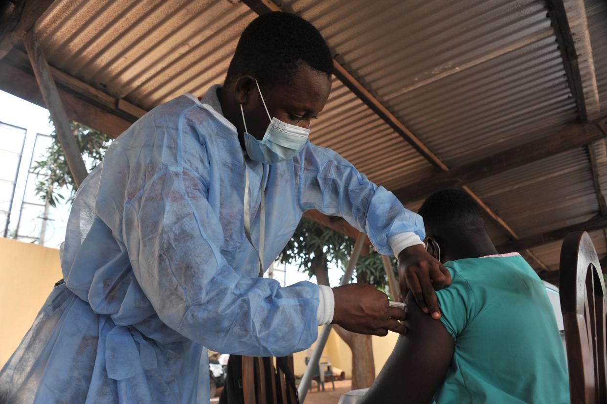 ACCRA, March 2, 2021 -- A nurse administers the COVID-19 vaccine to a man at a hospital in Accra, Ghana, on March 2, 2021. The government of Ghana Tuesday rolled out a program to commence the mass vaccination of people living in some 43 epicenter-districts in the Greater Accra, Ashanti and Central regions against the COVID-19 pandemic. (Photo by Seth/Xinhua via Getty) (Xinhua/Seth via Getty Images)