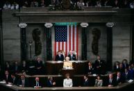 <p>While in Washington, D.C., Queen Elizabeth II delivers a speech in the Capitol.</p>