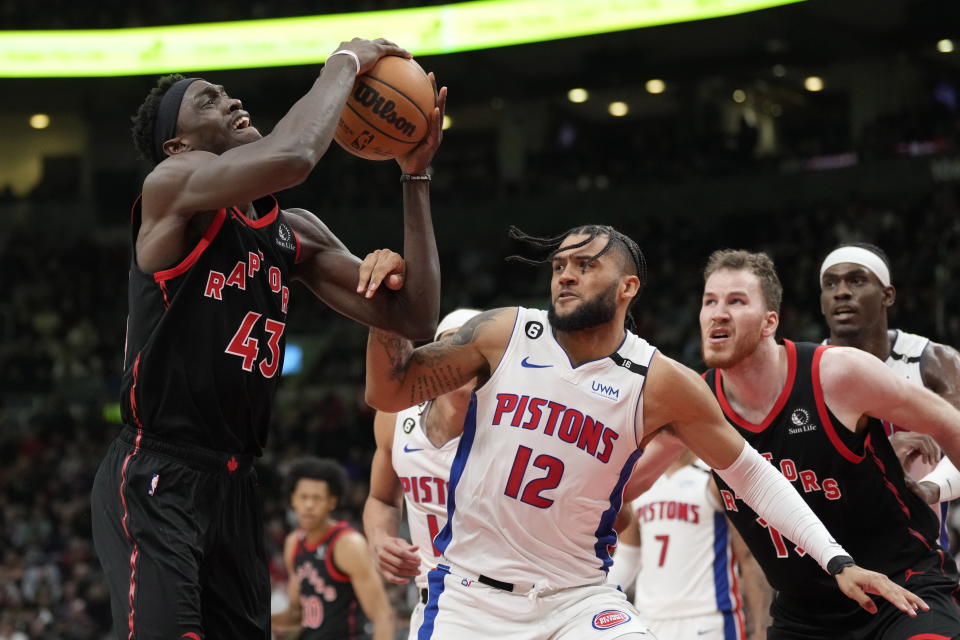 Toronto Raptors forward Pascal Siakam (43) is defended by Detroit Pistons forward Isaiah Livers (12) during the first half of an NBA basketball game Friday, March 24, 2023, in Toronto. (Frank Gunn/The Canadian Press via AP)