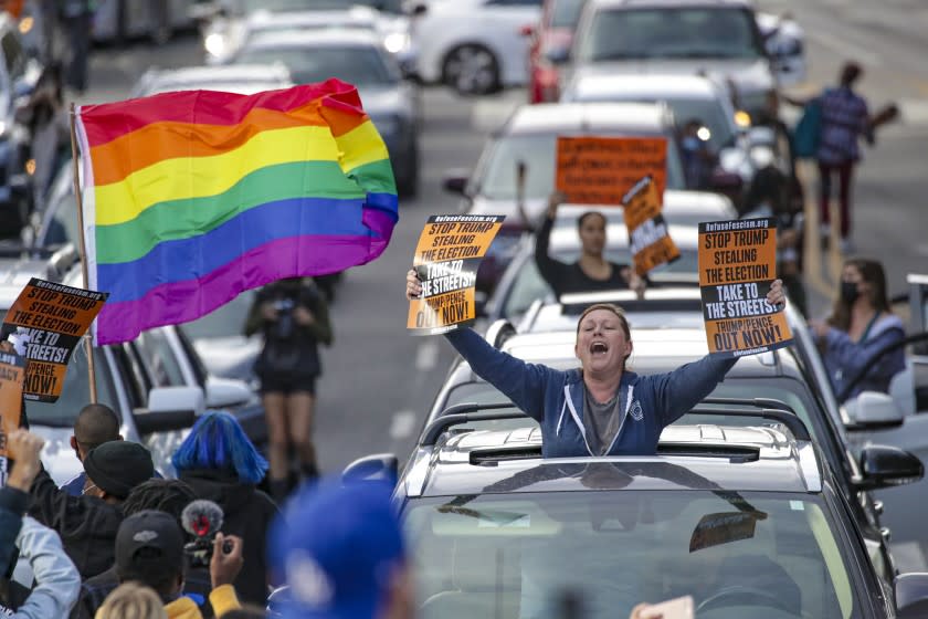 LOS ANGELES, CA - NOVEMBER 07: Angelenos celebrate Biden/Harris win near City Hall on Saturday, Nov. 7, 2020 in Los Angeles, CA. (Irfan Khan / Los Angeles Times)