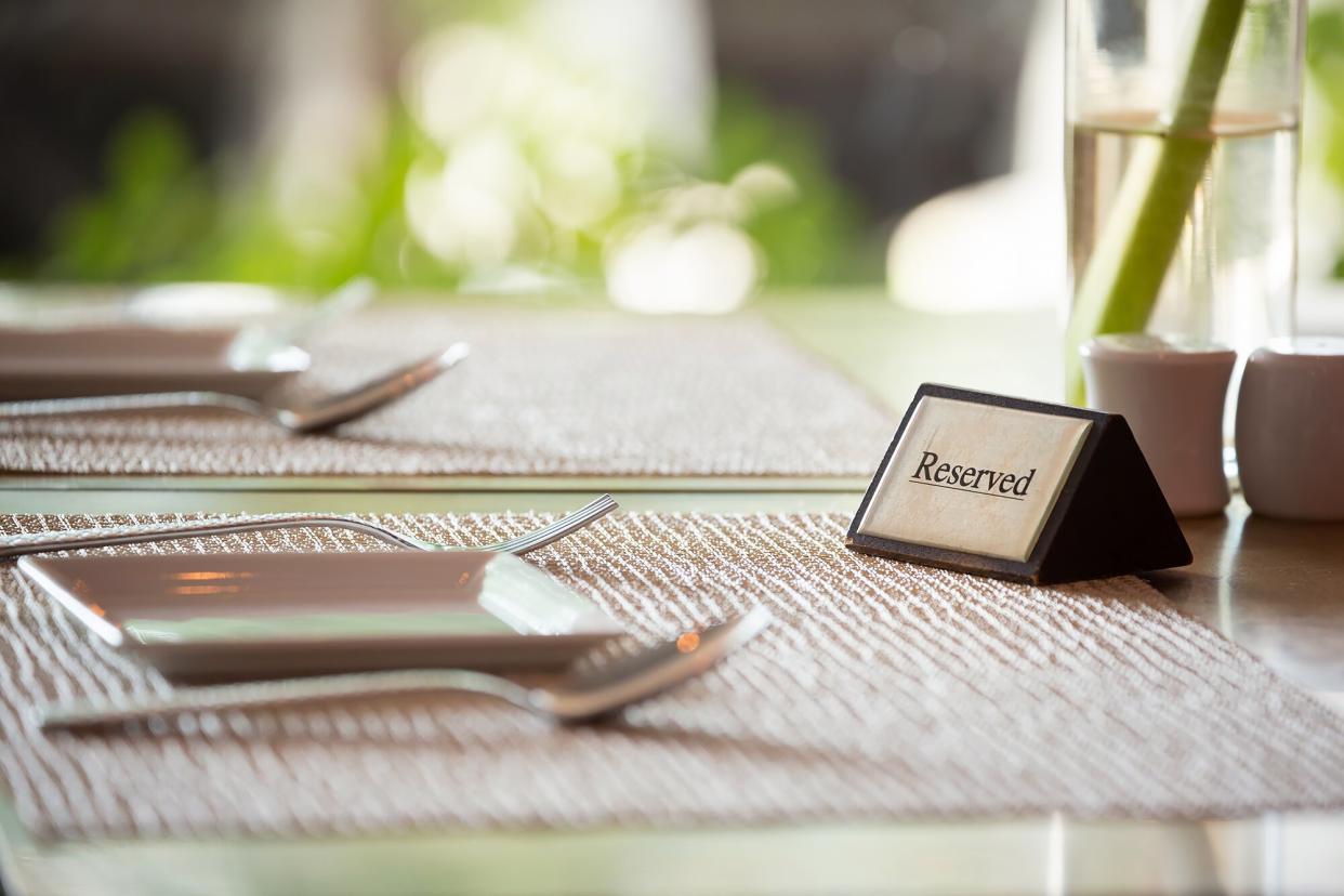 Reserved sign on a restaurant table