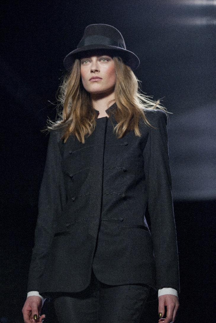 A model walks the runway during the Nicole Miller Fall 2013 fashion show during Fashion Week, Friday, Feb. 8, 2013, in New York. (AP Photo/Karly Domb Sadof)