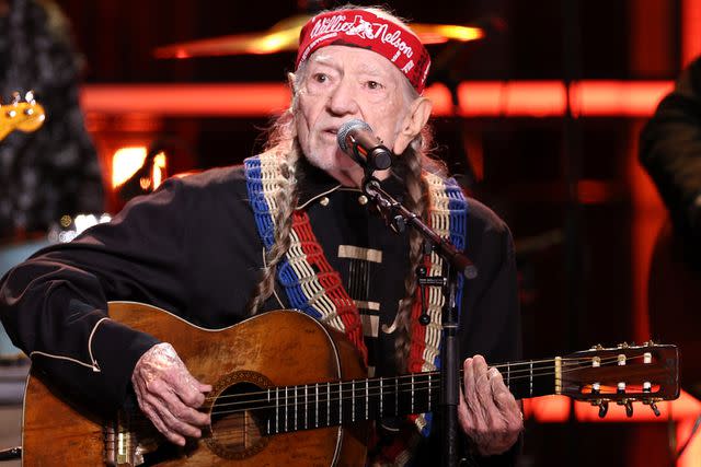 <p>Mike Coppola/WireImage</p> Willie Nelson performs in 2023