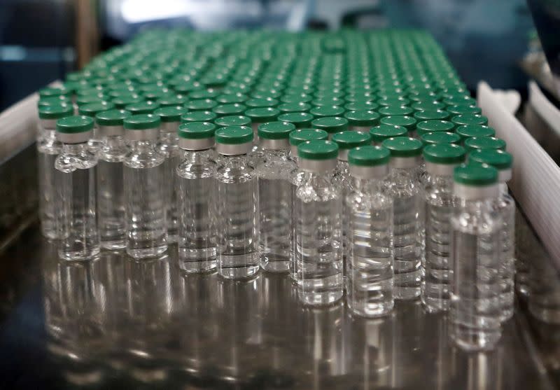 FILE PHOTO: Vials of AstraZeneca's COVISHIELD, coronavirus disease (COVID-19) vaccine are seen before they are packaged inside a lab at Serum Institute of India, in Pune