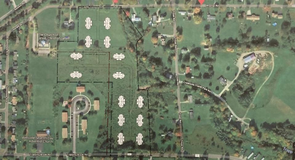 A rendering of a proposed housing development that would feature 14 multi-unit condominiums between Proctor and Trapping Brook roads in Wellsville.