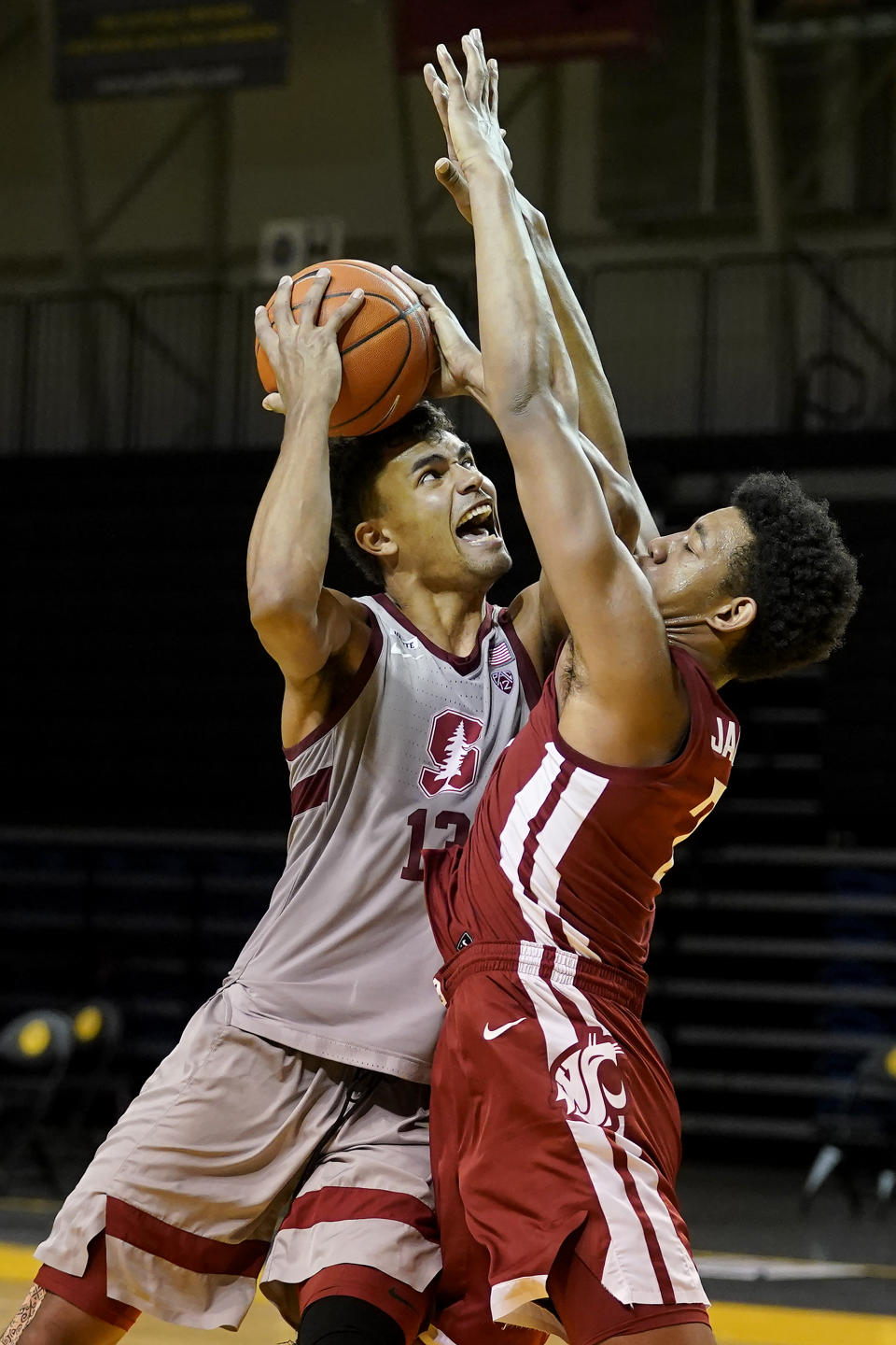 Stanford forward Oscar da Silva (13) shoots against Washington State center Dishon Jackson during the second half of an NCAA college basketball game in Santa Cruz, Calif., Saturday, Jan. 9, 2021. (AP Photo/Jeff Chiu)