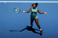 Tennis - Australian Open - Quarter-final - Melbourne Park, Melbourne, Australia, January 23, 2019. Serena Williams of the U.S. in action with Czech Republic's Karolina Pliskova. REUTERS/Kim Kyung-Hoon