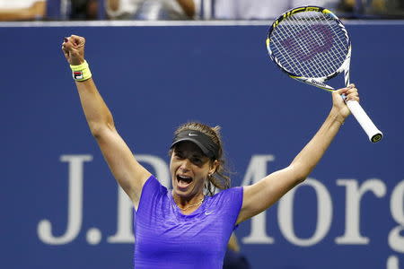 Petra Cetkovska of Czech Republic celebrates her win over Caroline Wozniacki of Denmark during their second round match at the U.S. Open Championships tennis tournament in New York, September 4, 2015. REUTERS/Shannon Stapleton