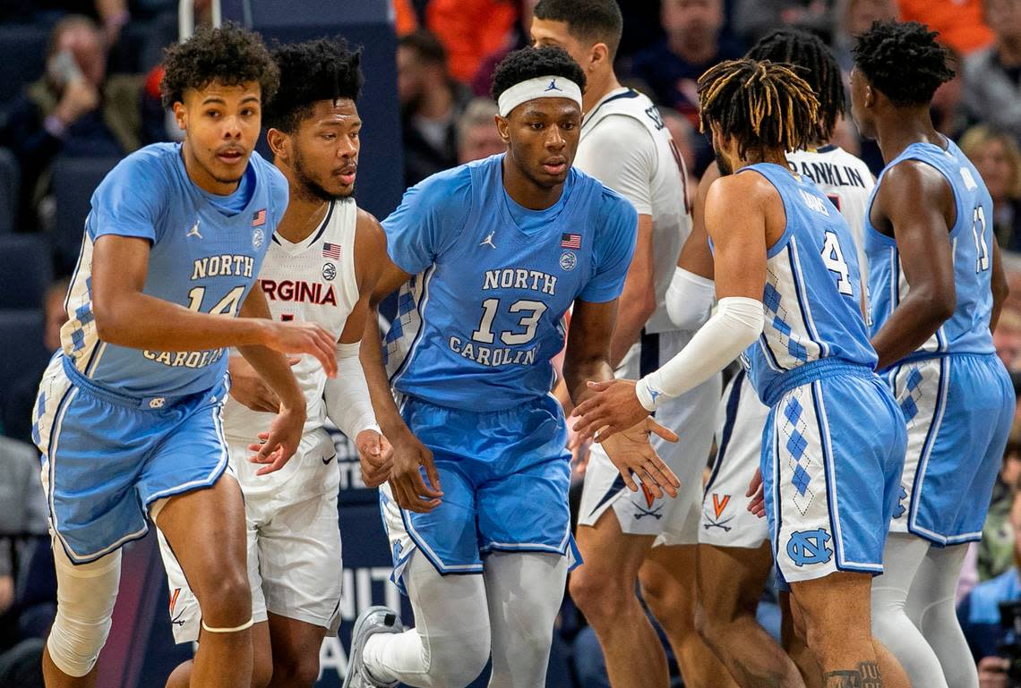 North Carolina’s Jalen Washington (13) reacts after sinking a basket in the first half against Virginia on Tuesday, January 10, 2023 at John Paul Jones Arena in Charlottesville, Va.