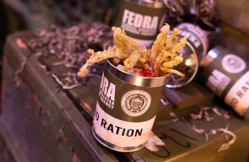 The Left Behind Ravioli featured at Universal Orlando's Taste of Terror for Halloween Horror Nights. Inspired by the Last of Us, it is cheese ravioli topped with truffle cream and tempura fried enoki mushrooms.