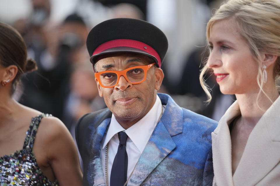 Jury president Spike Lee, centre, poses for photographers upon arrival at the awards ceremony and premiere of the closing film 'OSS 117: From Africa with Love' at the 74th international film festival, Cannes, southern France, Saturday, July 17, 2021. (AP Photo/Vadim Ghirda)