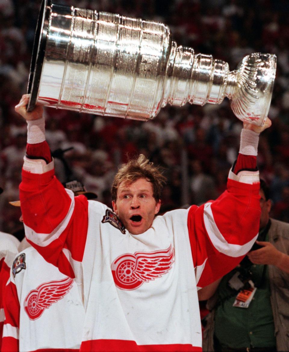 June 7, 1997, Vladimir Konstantinov takes his turn with the Stanley Cup after the victory against the Flyers. A week later he was seriously injured in a limousine accident.