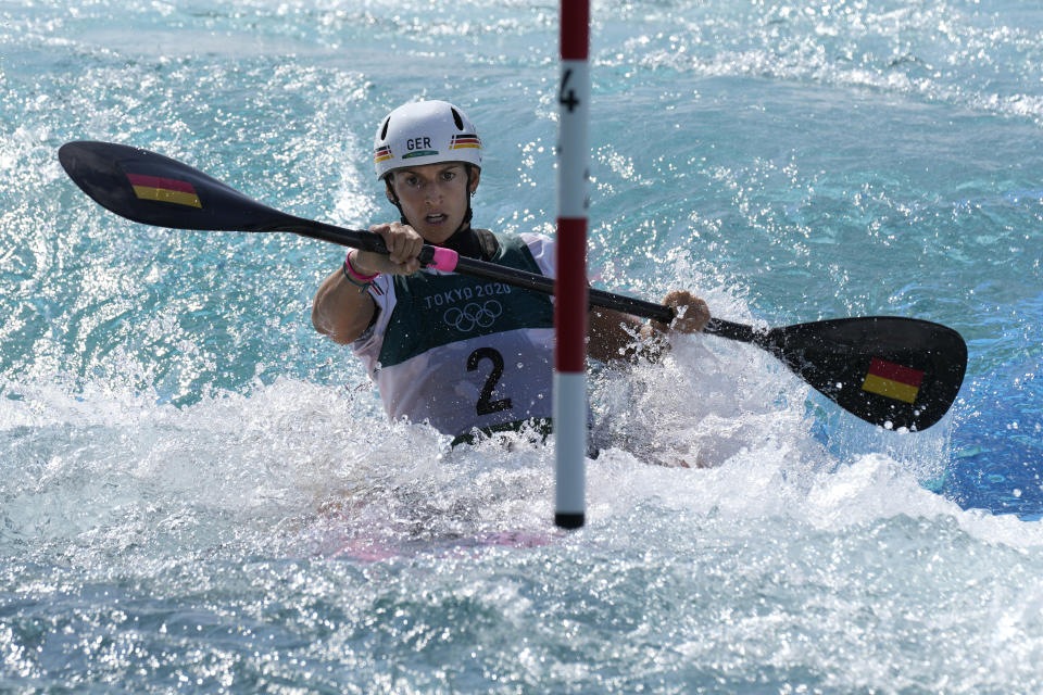 Ricarda Funk of Germany competes in the Women's K1 heats of the Canoe Slalom at the 2020 Summer Olympics, Sunday, July 25, 2021, in Tokyo, Japan. (AP Photo/Kirsty Wigglesworth)