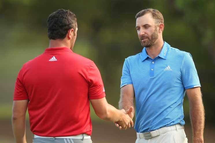 Dustin Johnson shakes Jon Rahm’s hand after winning the WGC-Dell Technologies Match Play. (Getty Images)