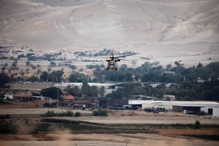 A helicopter takes off as it transports Israeli Prime Minister Benjamin Netanyahu following a weekly cabinet meeting in the Jordan Valley, in the Israeli-occupied West Bank