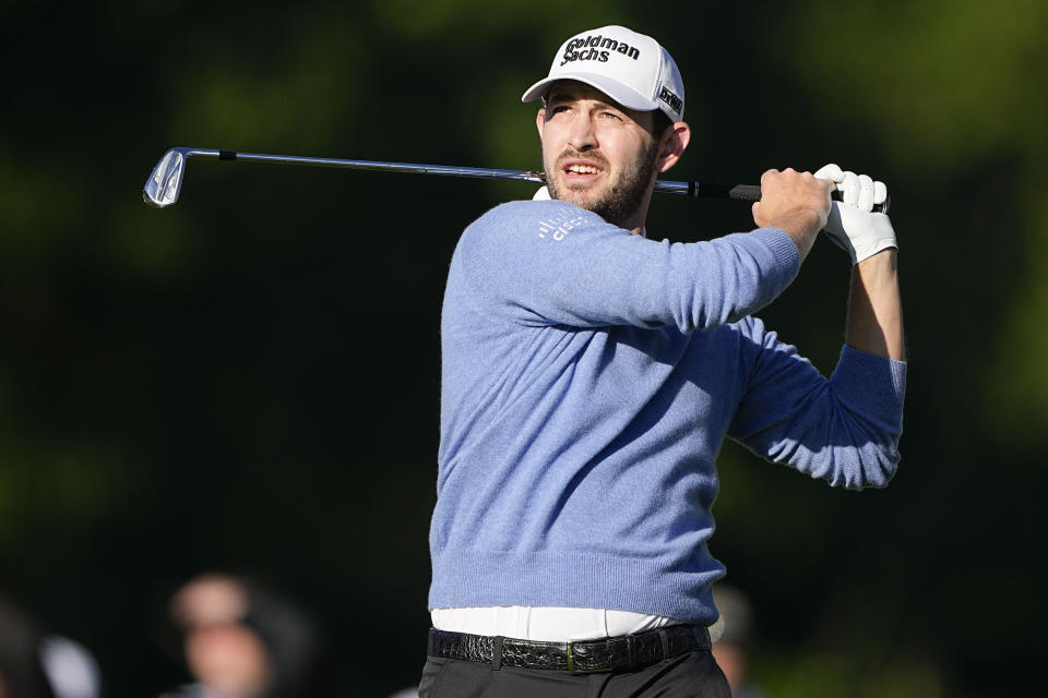 Patrick Cantlay watches his tee shot on the 13th hole during first round of the Wells Fargo Championship golf tournament at the Quail Hollow Club on Thursday, May 4, 2023, in Charlotte, N.C. (AP Photo/Chris Carlson)