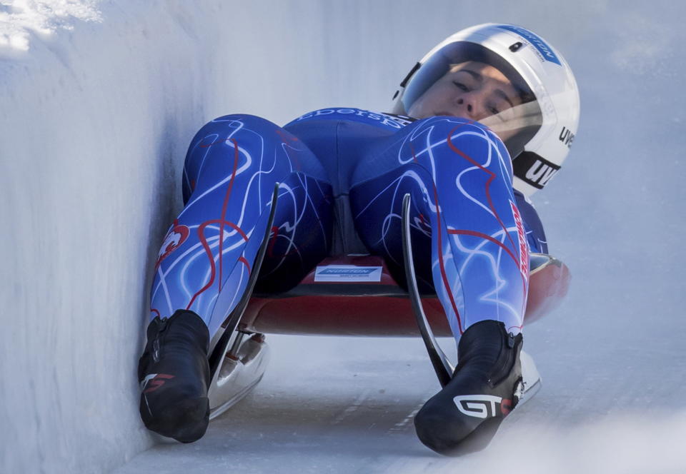 Emily Sweeney, of the United States, hits the wall after racing to a third-place finish during a World Cup women's luge event in Whistler, British Columbia, on Saturday, Dec. 1, 2018. (Darryl Dyck/The Canadian Press via AP)