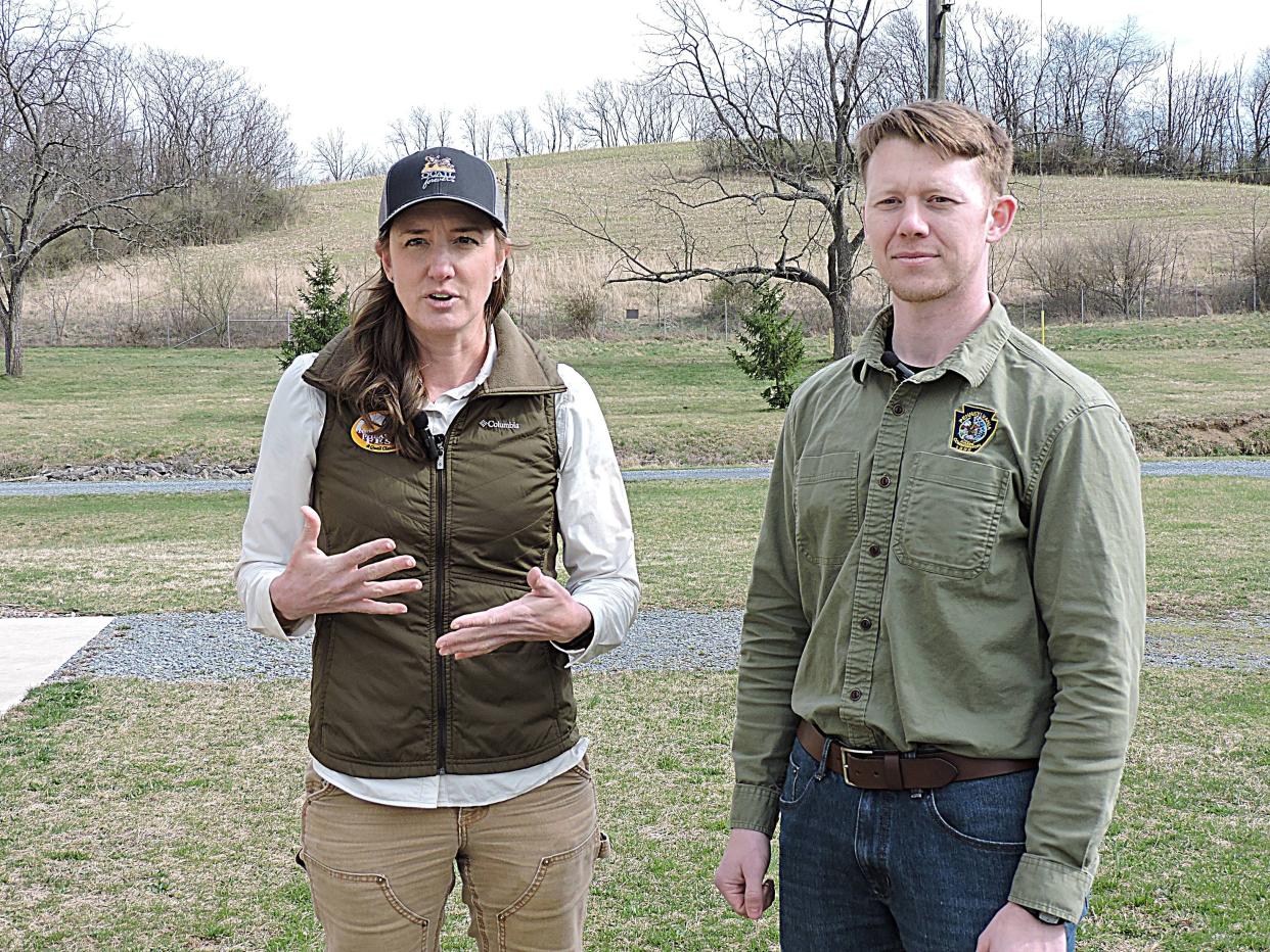 Julia Smith, Pennsylvania state coordinator for Pheasants Forever and Quail Forever, and Andrew Ward, quail, pheasant and dove biologist for the Pennsylvania Game Commission, talk March 19 about the wild northern bobwhite quail being released at Letterkenny Army Depot.