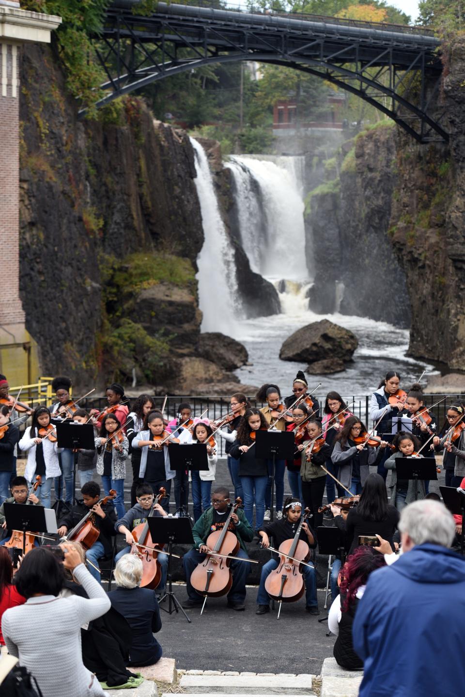 The 2018 Art in the Park Showcase was held in Overlook Park, located at the Paterson Great Falls National Historical Park on Sunday, October 14, 2018. Members of the Paterson Music Project perform during the showcase.