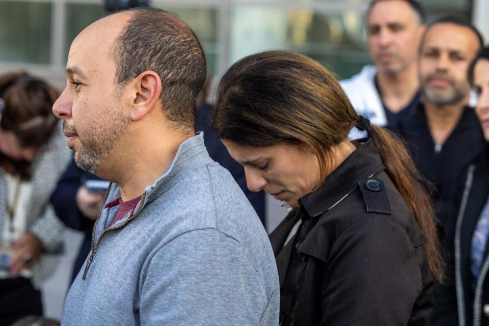 Karim and Nancy Iskander talk with media outside Van Nuys courtroom after verdict.