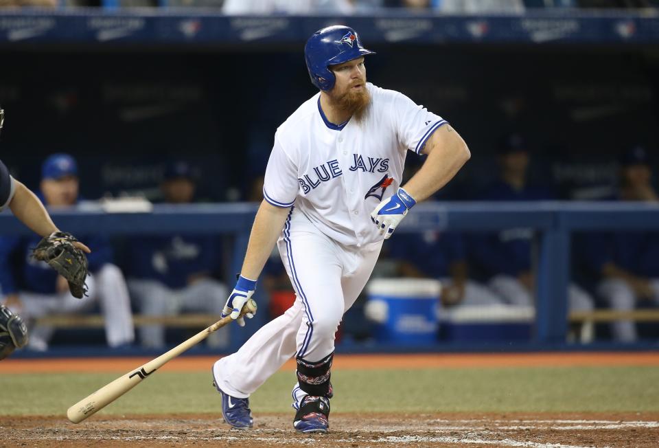Adam Lind was traded from the Blue Jays to Milwaukee on Saturday. (Tom Szczerbowski/Getty Images)