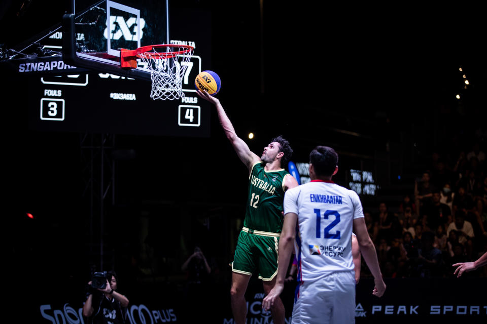 Basketball action at the Singapore Sports Hub OCBC Square, as Australia (green jersey) take on Mongolia in the men's final of the FIBA 3x3 Asia Cup. (PHOTO: FIBA)
