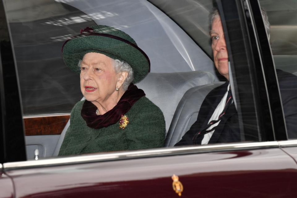 Queen Elizabeth II and her second son, Prince Andrew, Duke of York, after attending a service of thanksgiving for her late husband, Prince Philip, Duke of Edinburgh, at Westminster Abbey in London on March 29, 2022.
