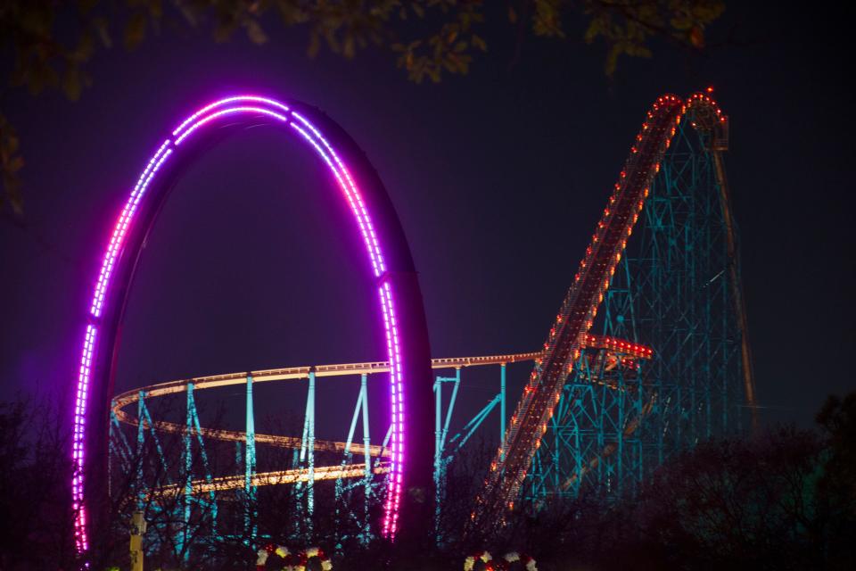 The roller coasters and rides at Six Flags Over Texas, most of which are open for its winter festival, are decked out with holiday lights.