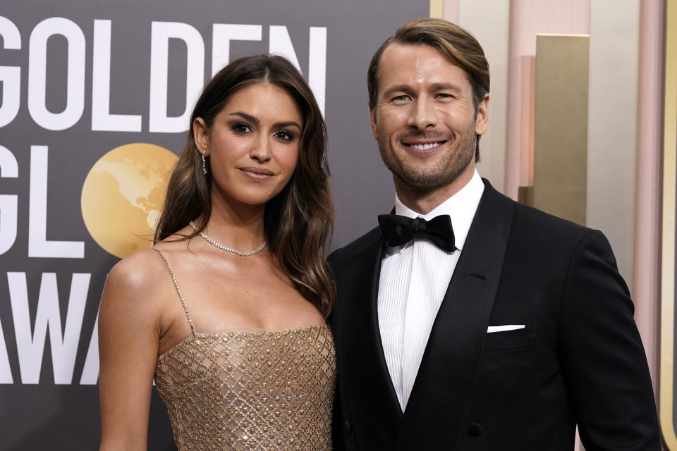 Gigi Paris, left, and Glen Powell arrive at the 80th annual Golden Globe Awards at the Beverly Hilton Hotel on Tuesday, Jan. 10, 2023, in Beverly Hills, Calif. (Photo by Jordan Strauss/Invision/AP)