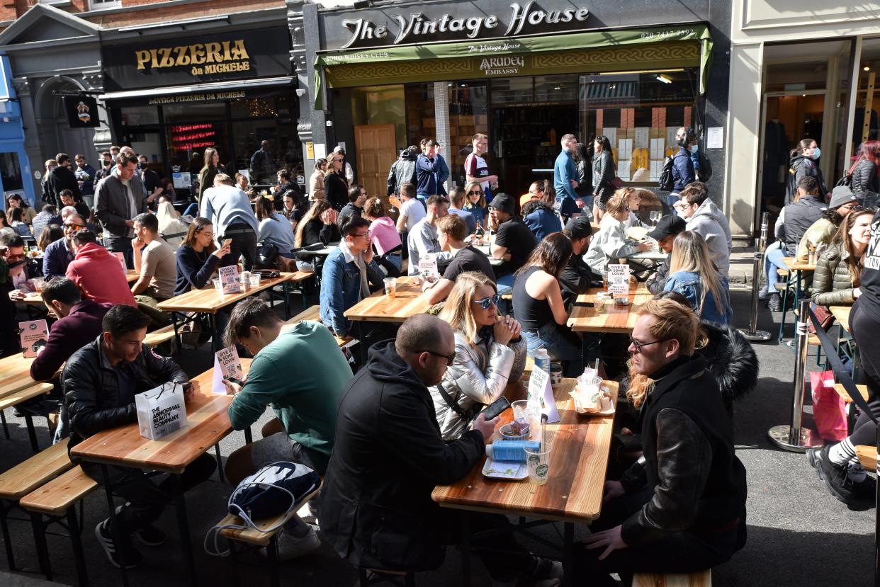 People enjoying some alfresco dining in Soho, London, in April (Barcroft Media via Getty Images)