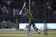 Pakistan's Babar Azam plays a shot during the fifth T20 international cricket match between Pakistan and New Zealand, in Lahore, Pakistan, Saturday, April 27, 2024. (AP Photo/K.M. Chaudary)