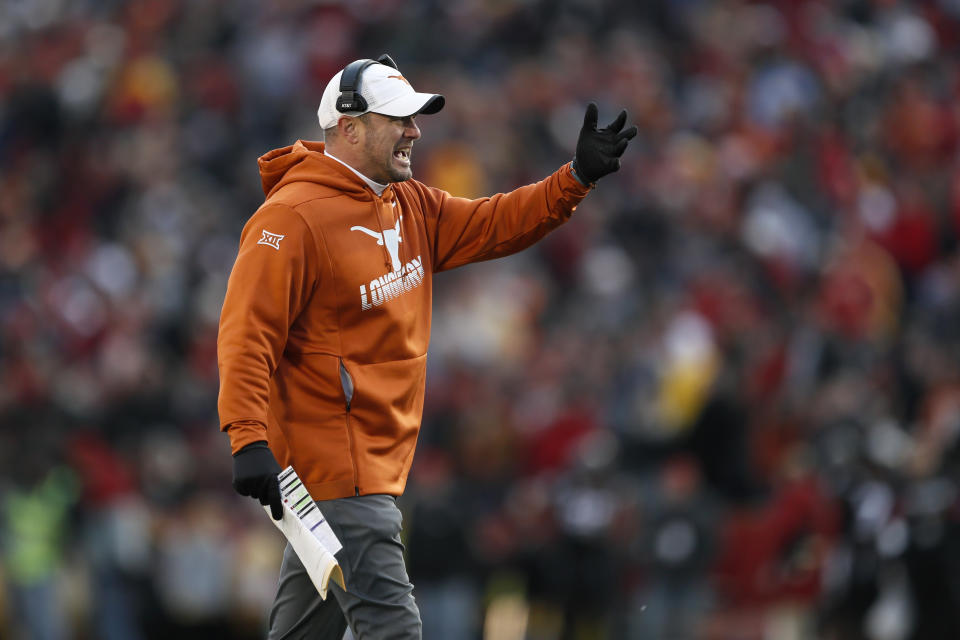 Texas head coach Tom Herman questions a call against his team during the first half of an NCAA college football game against Iowa State, Saturday, Nov. 16, 2019, in Ames, Iowa. Iowa State won 23-21. (AP Photo/Charlie Neibergall)