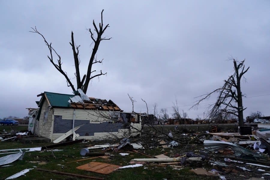 Debris is visible following a severe storm Friday, March 15, 2024, in Lakeview, Ohio. (AP Photo/Joshua A. Bickel)