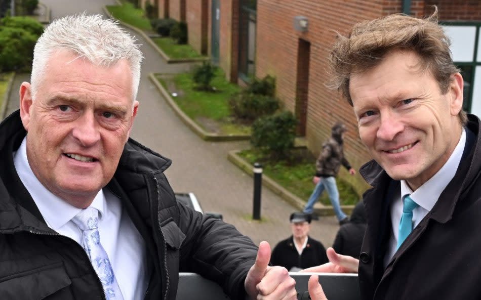 Reform Party MP Lee Anderson and leader Richard Tice on their campaign bus on March 15 in Kirkby, Ashfield, Notts