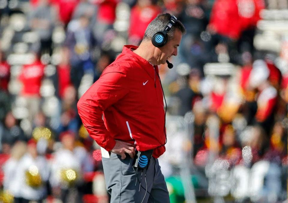 Ohio State Buckeyes head coach Urban Meyer looks down against Maryland Terrapins during the 1st quarter of their game at Capital One Field at Maryland Stadium in College Park, Maryland on November 17, 2018.