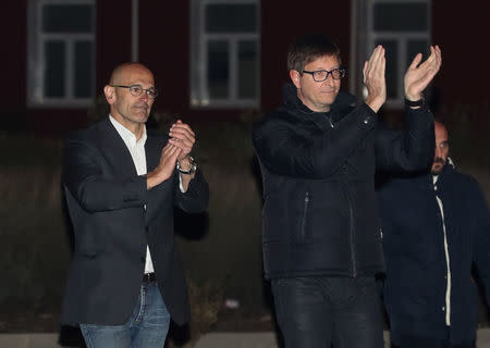 Former Catalonia cabinet members Raul Romeva (L) and Carles Mundo leave prison after being released on bail before facing potential charges of sedition, rebellion and misappropriation of funds, in Estremera, outside Madrid, Spain, December 4, 2017. REUTERS/Juan Medina